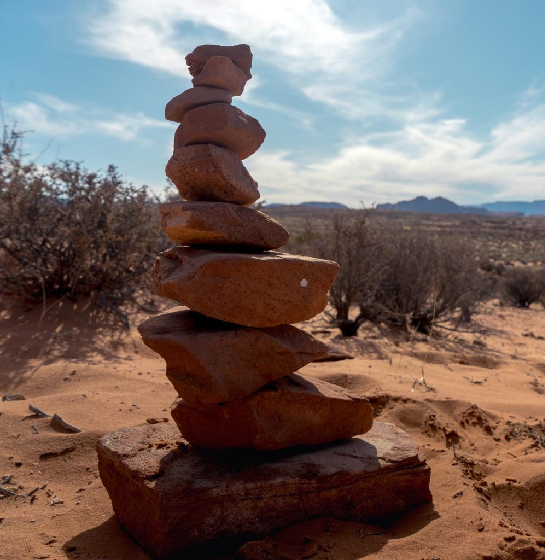 a stack of rocks in the desert