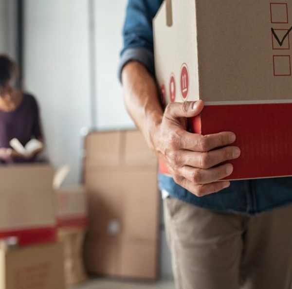 a person holding a box