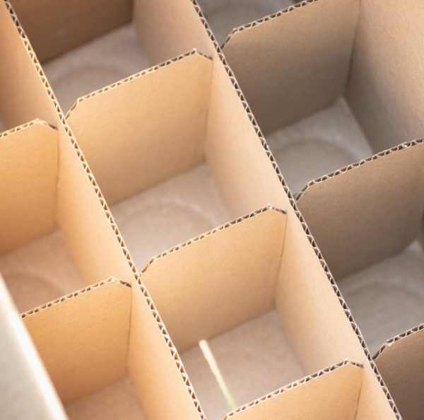 a cardboard box with persony compartments